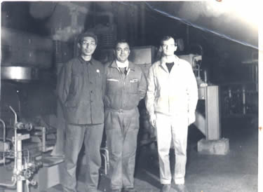 Wenguang  Han --  1980 year.(43 years old) After the turbine compressor to replace a new rotor compensatived hy French corp., joint photo with French experts in the night.