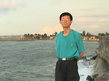 A memento photo in beach of Havana in 2003