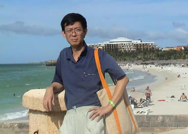 A memento photo in beach of Havana in 2003