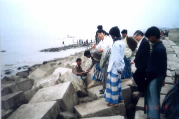 Hidden smuggling beer below a stone of the bank