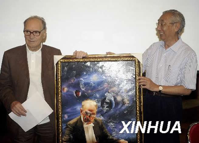 I met the Great Master Ennio Morricone and Gift to him in last year (May 22, 2009) in Beijing in a press conference 